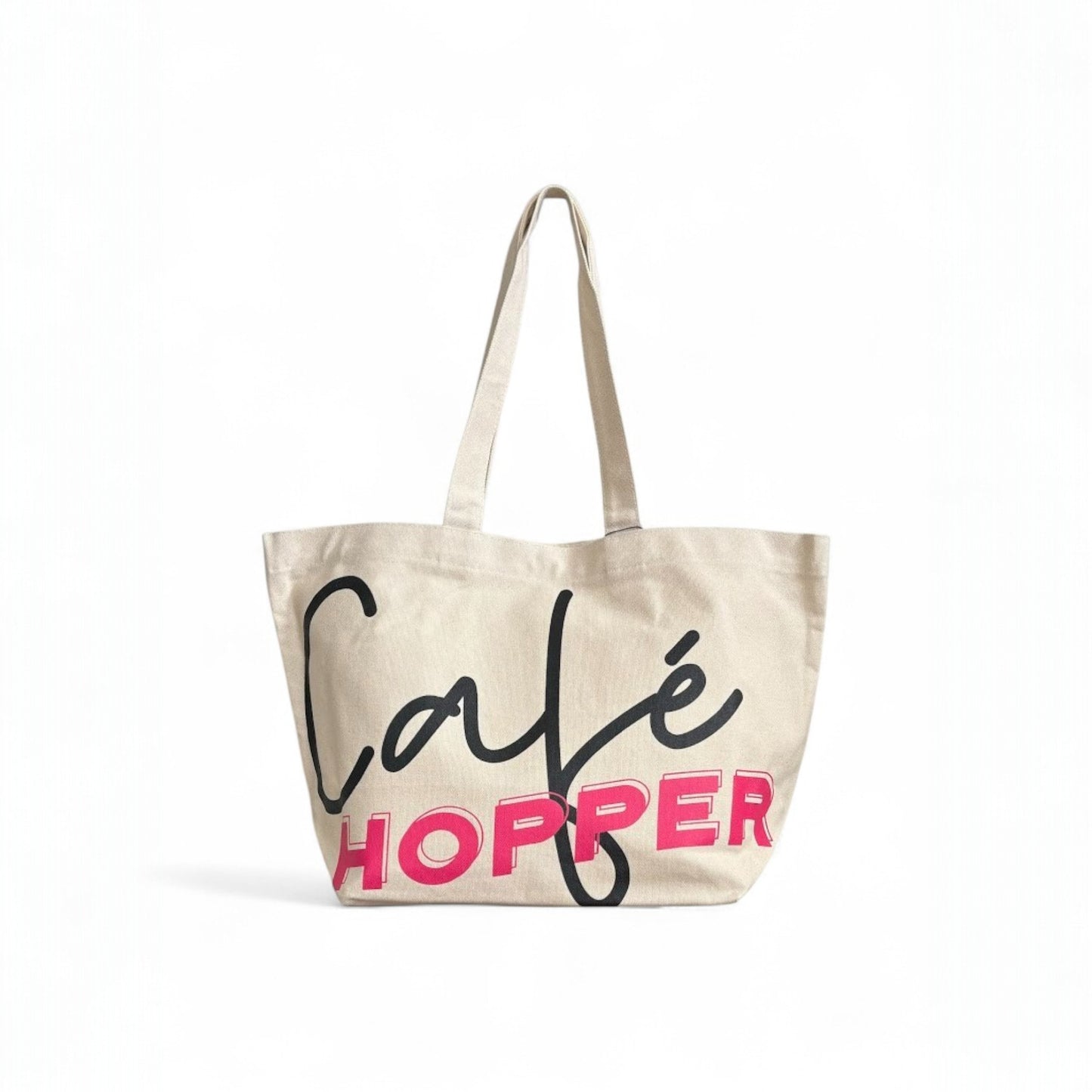 Oversized Café Hopper tote with long handles and modern lettering design for everyday carry.