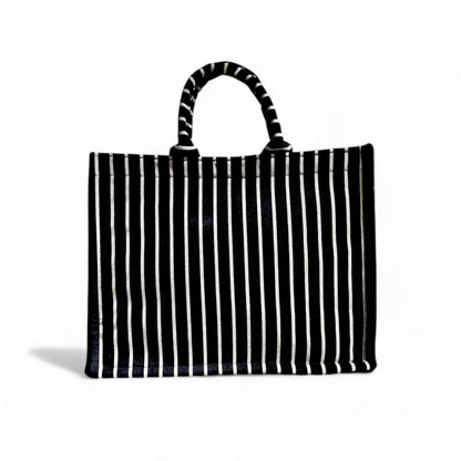 Front view of a black and grey stripe book tote bag.