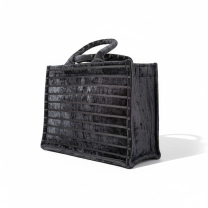 Book Tote Black Chenille handbag, luxury striped top handle tote bag shown side view.