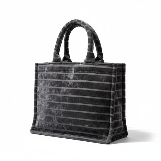 Front-angle view of an elegant Black Chenille Book Tote, an everyday tote bag in textured striped fabric.