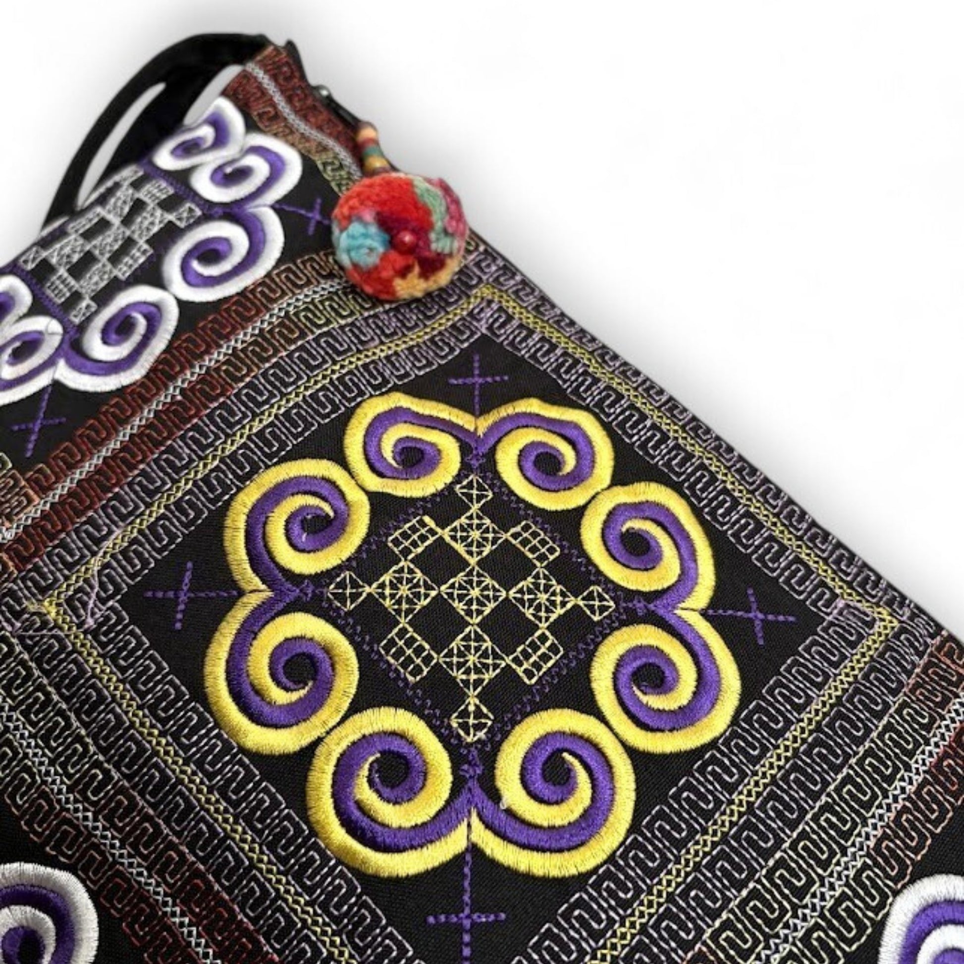 Close-up of an embroidered fabric with Hmong tradition patterns.