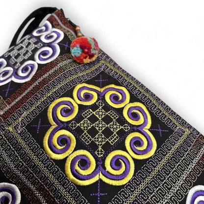 Close-up of an embroidered fabric with Hmong tradition patterns.