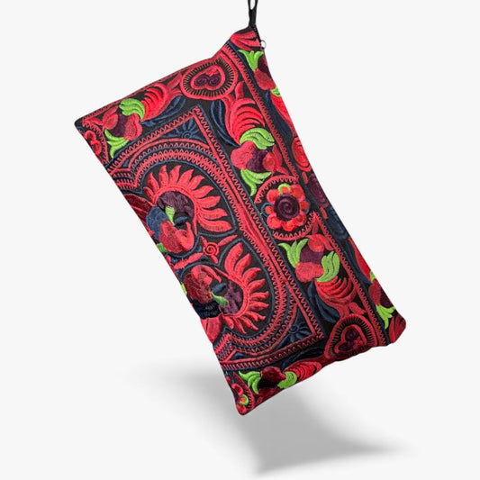 Handmade Hmong wristlet clutch with bold red and green floral embroidery for everyday use.