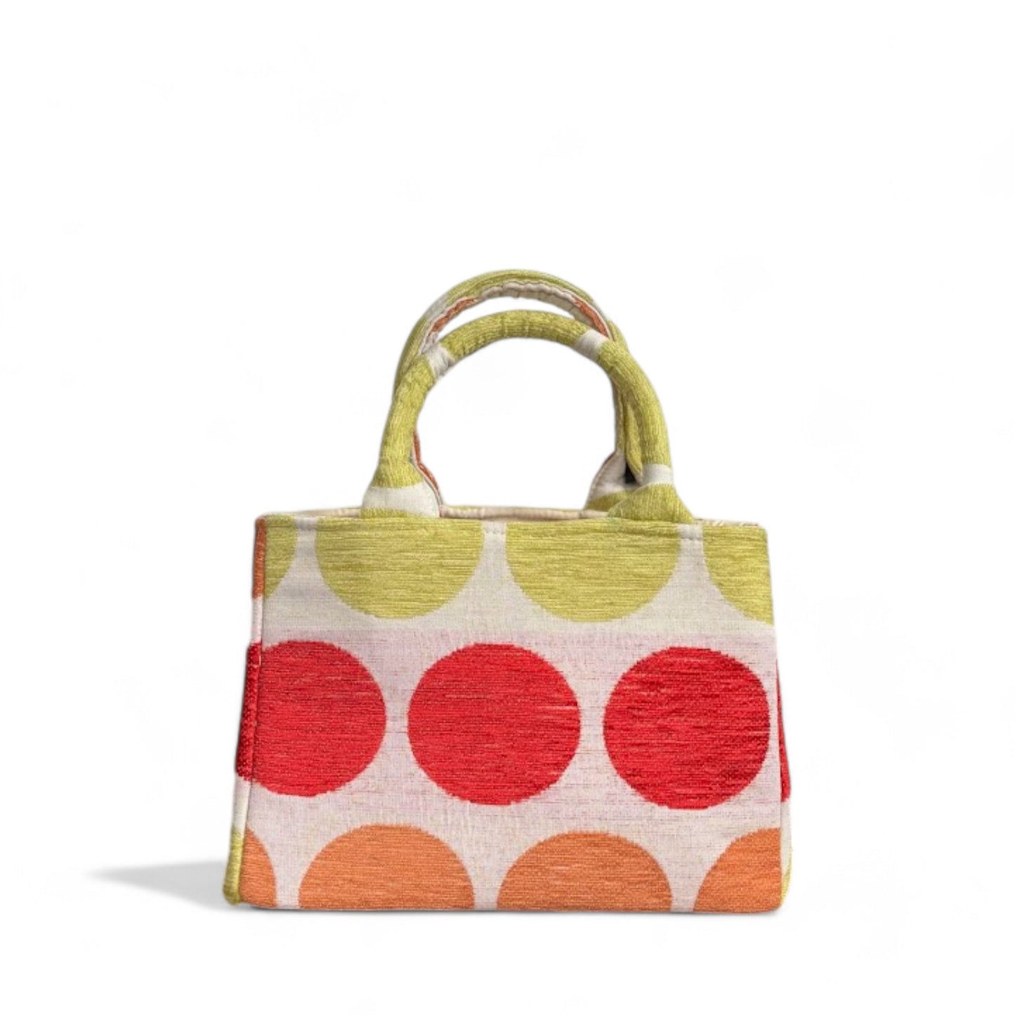 Mini tote bag features large dots in vibrant red, green, and orange on beige fabric.