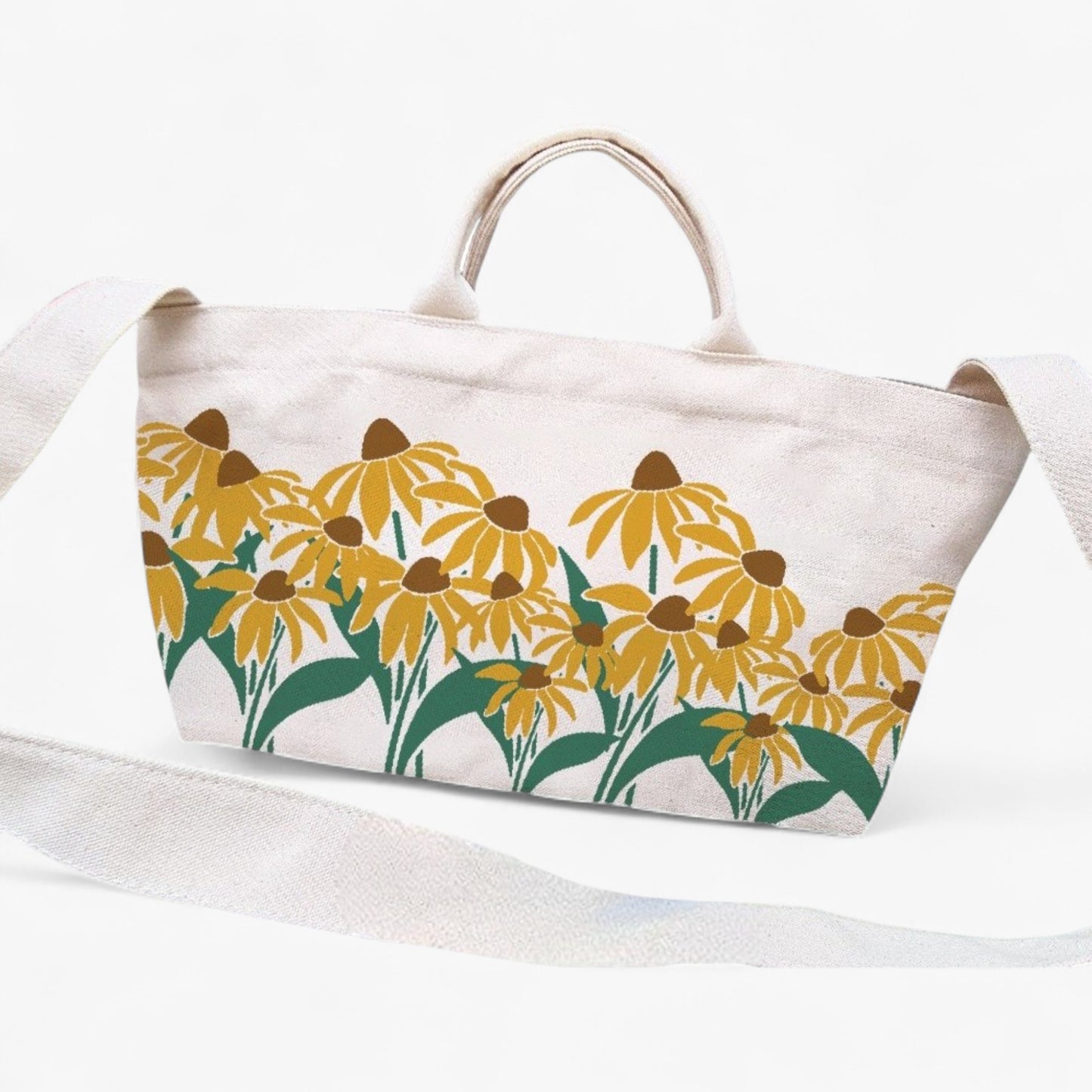 Canvas tote bag with sunflower print and shoulder strap and top handles.