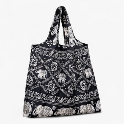 Dark brown everyday tote bag with light brown elephant pattern. 