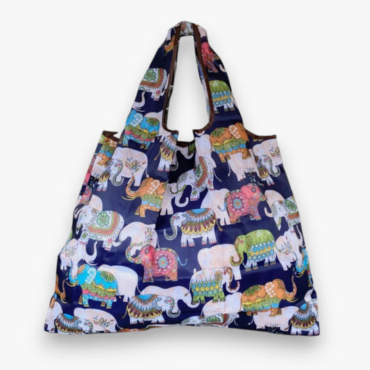 Front view of a navy nylon tote bag with a colourful elephant pattern.