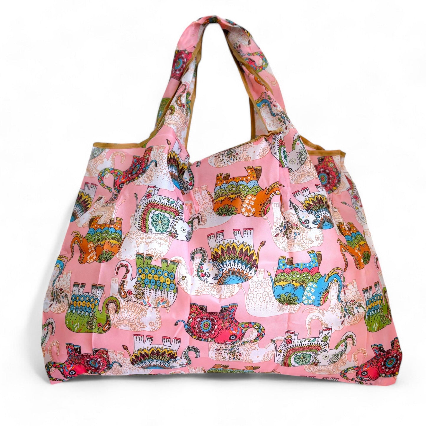 Front view of a pink nylon tote bag with colourful upside-down elephant patterns.